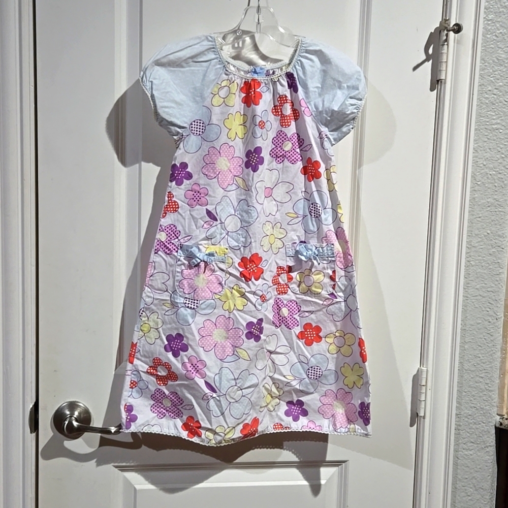 mini Boden floral printed woven dress with elastic neck and arm holes. size 7